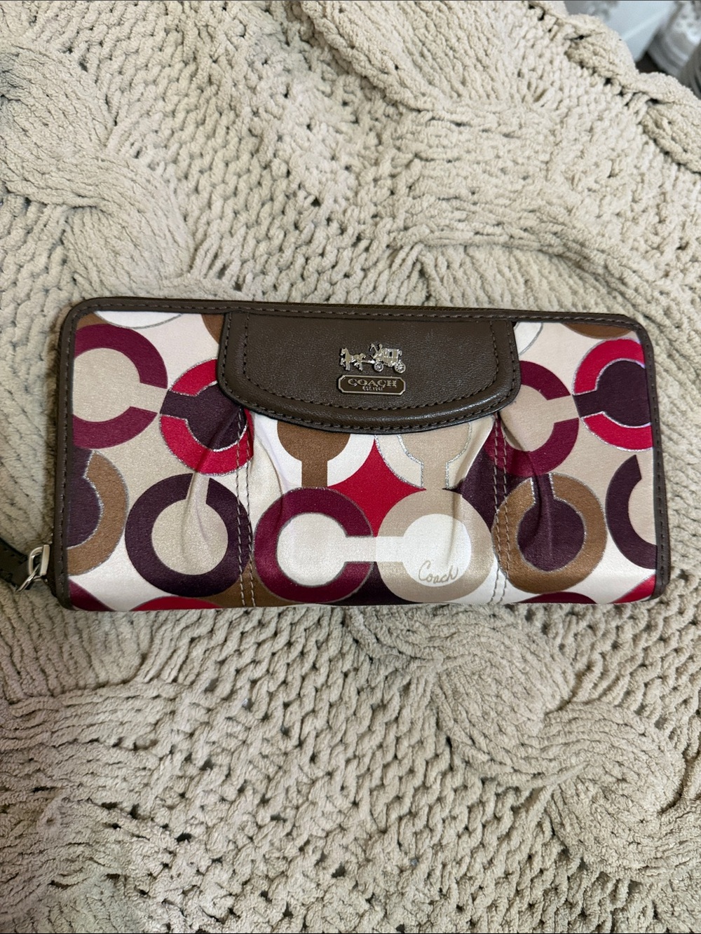 Coach Op Art Zip Around Wallet in shades of red, tan, and brown *NWOT*